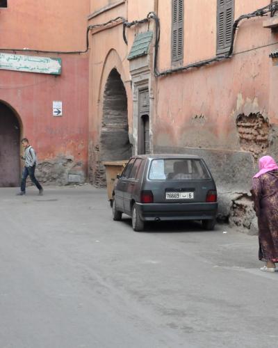 A street and arched gateway in the Mellah of Marrakesh