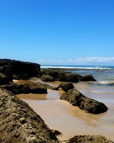 Rocky shoreline and Atlantic beach at Sidi Bouzid near El Jadida