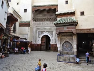 Nejjarine square with its fountain and the museum's façade in Fes