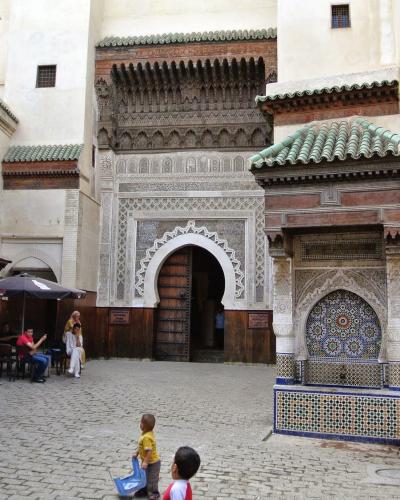 Nejjarine square with its fountain and the museum's façade in Fes