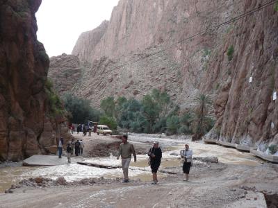 Walkers between the sheer walls of the Todra Gorge
