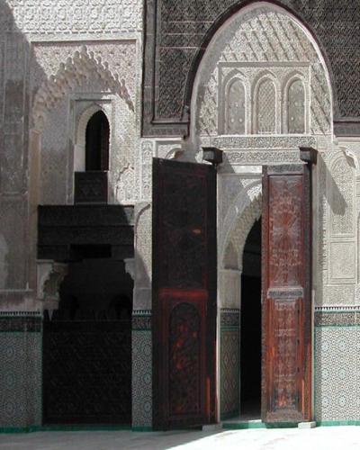 Carved wood and zellige tilework at the Zaouia of Moulay Idriss II in Fez